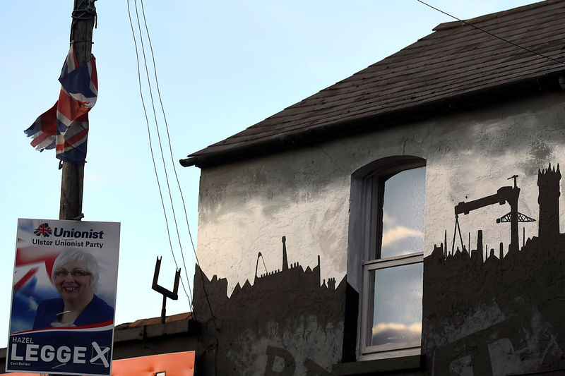 © Reuters. A Democratic Unionist Party election poster is seen in Belfast