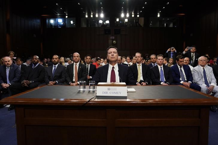 © Reuters. Former FBI Director Comey testifies before a Senate Intelligence Committee hearing in Washington