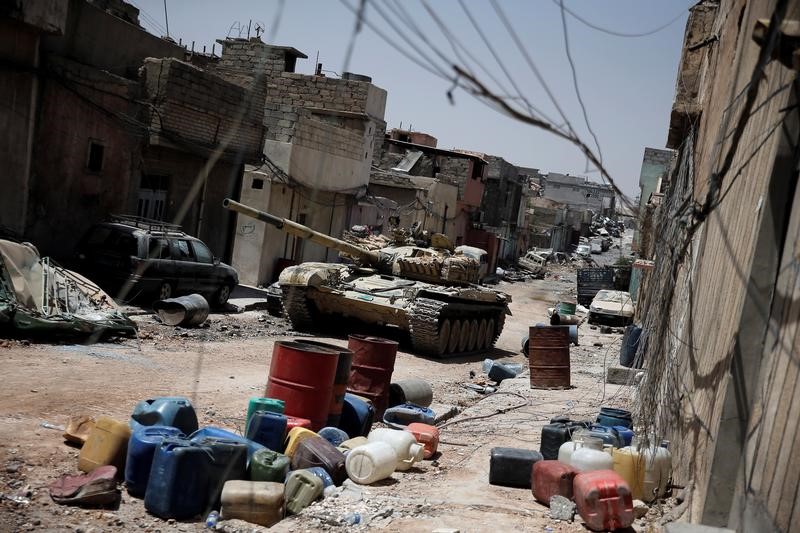 © Reuters. القوات العراقية تصد هجوما للدولة الإسلامية جنوبي الموصل
