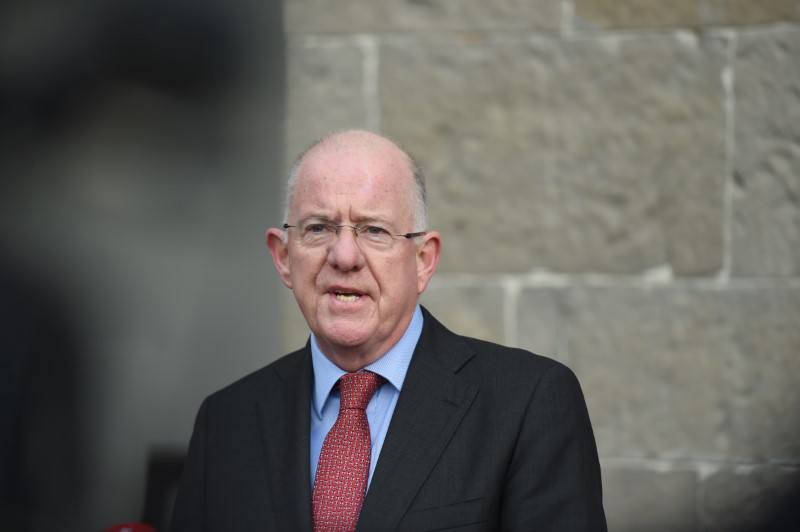 © Reuters. Ireland's Minister for Foreign Affairs Charlie Flanagan speaks to the media on arrival at the All-Island Civic Dialogue on Brexit in Dublin