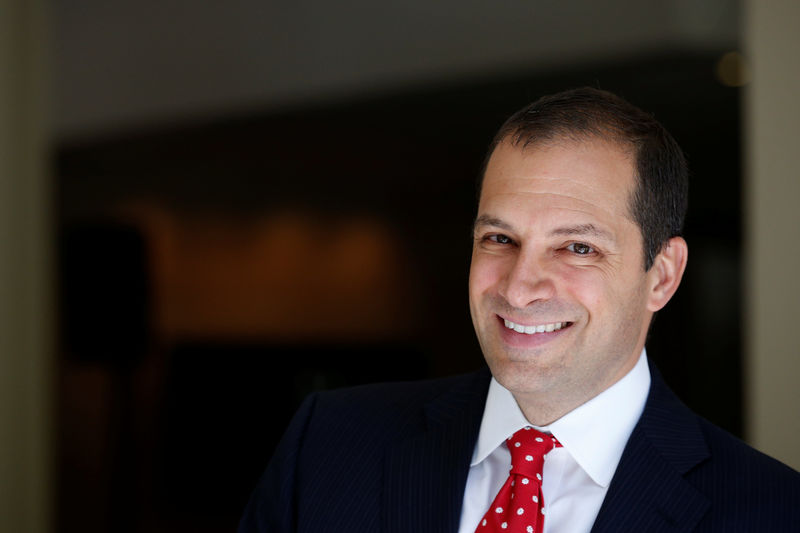 © Reuters. Mitch Golden, portfolio manager for hedge fund Greenlight Masters, poses following an interview at the Sohn Investment Conference in New York