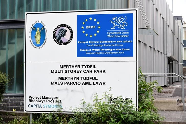 © Reuters. A European Regional Development sign outside the multi storey car park in the centre of Merthyr Tydfil,