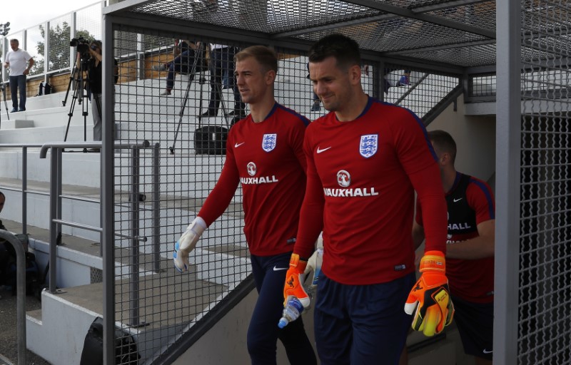 © Reuters. England's Jack Butland and Tom Heaton during training