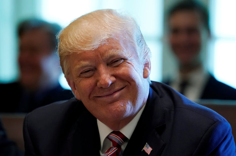 © Reuters. U.S. President Trump smiles during a meeting with members of his Cabinet at the White House in Washington