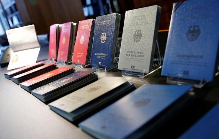 © Reuters. Specimens of the German new electronic passports are pictured during a presentation to the media in Berlin