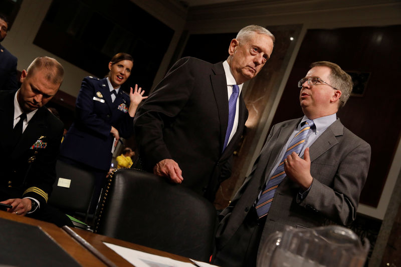 © Reuters. U.S. Defense Secretary Mattis listens to Undersecretary Norquist ahead of testifying before the Senate Armed Services Committee on Capitol Hill in Washington