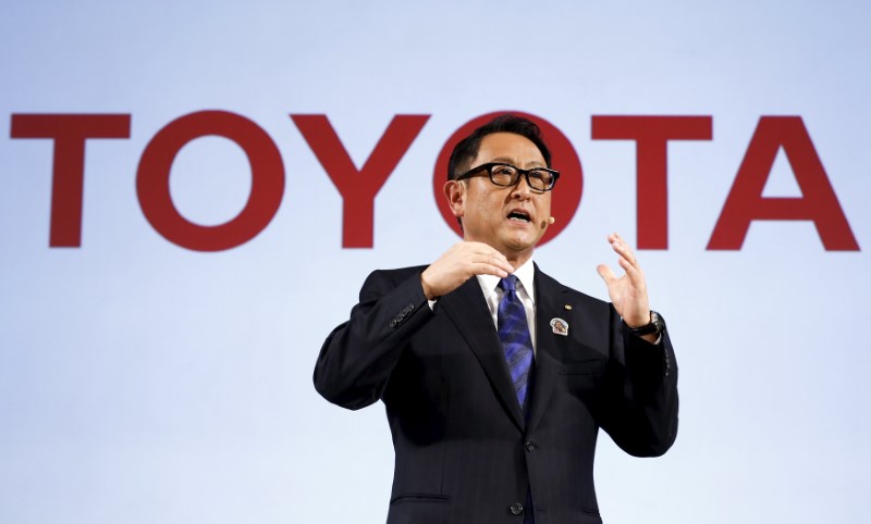 © Reuters. President of the Toyota Motor Corporation Akio Toyoda delivers a speech before signing a partnership deal with the International Paralympic Committee in Tokyo