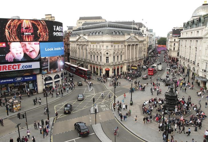 © Reuters. Piccadilly Circus at rush hour, much less congested than usual, in central London