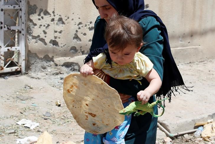 © Reuters. سكان الموصل القديمة في رمضان .. جوع وخوف في ظل الدولة الإسلامية