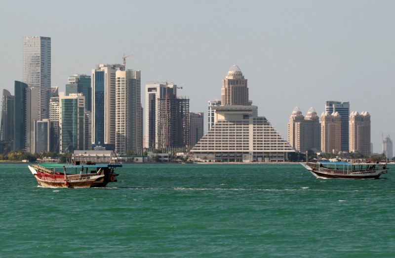 © Reuters. FILE PHOTO: Buildings are seen on a coast line in Doha