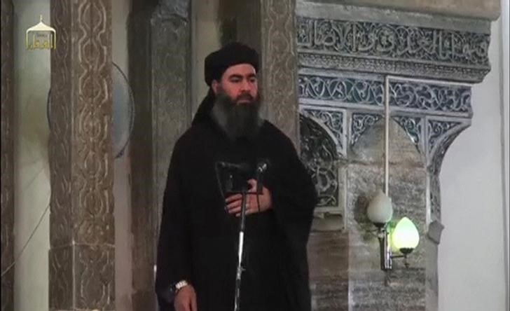 © Reuters. Abu Bakr al-Baghdadi in una foto d'archivio a Mosul