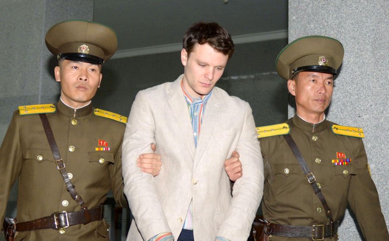 © Reuters. FILE PHOTO - Otto Frederick Warmbier is taken to North Korea's top court in Pyongyang North Korea