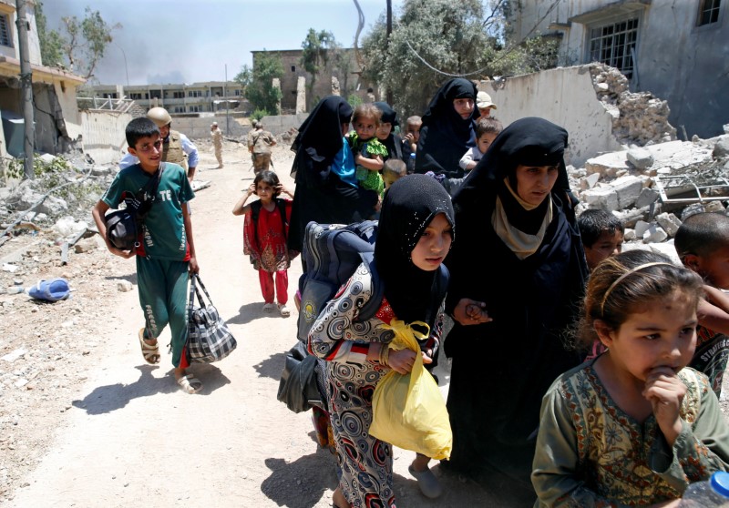 © Reuters. الأمم المتحدة: 100 ألف مدني في مناطق خاضعة لسيطرة الدولة الإسلامية في الموصل