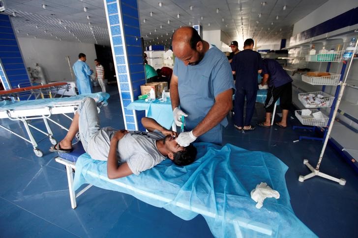 © Reuters. نشطاء ينتقدون خطة أوغندا لإرسال ألف عامل طبي إلى ليبيا