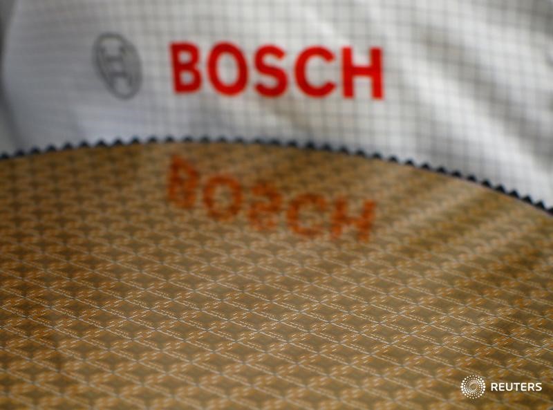 © Reuters. Bosch logo is reflected in semiconductor wafer in company manufacturing base in Reutlingen
