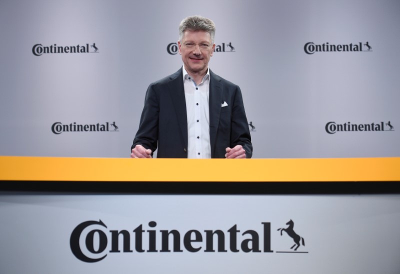 © Reuters. Elmar Degenhart, CEO of German tyre company Continental, poses for the media before the annual news conference in Hanover