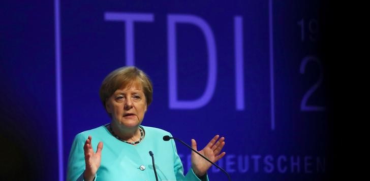 © Reuters. German Chancellor Merkel attends the German Industry Day in Berlin