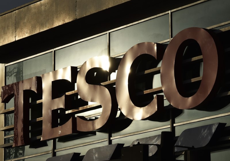 © Reuters. Signage is seen at Tesco supermarket in central London