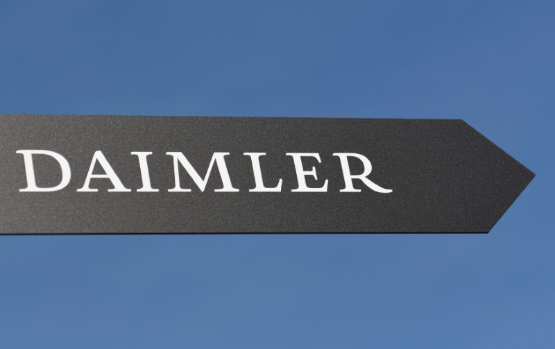 © Reuters. Daimler AG sign is pictured at the IAA truck show in Hanover