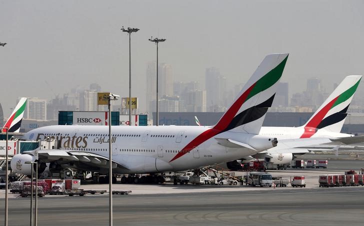 © Reuters. Emirates Airlines aircrafts are seen at Dubai International Airport