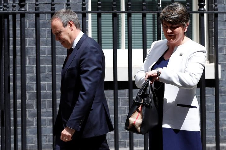 © Reuters. The leader of the Democratic Unionist Party, Arlene Foster, and the Deputy Leader Nigel Dodds, arrive at 10 Downing Street before talks with Prime Minister Theresa May, in central London