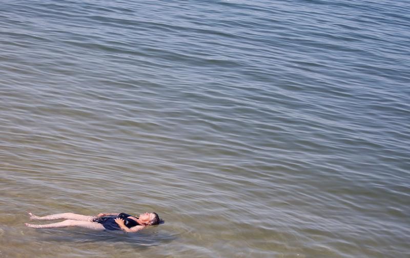 © Reuters. L'HÉMISPHÈRE NORD BALAYÉ PAR UNE VAGUE DE CHALEUR EXCEPTIONNELLE