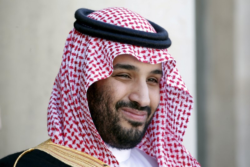 © Reuters. FILE PHOTO - Saudi Arabia's Deputy Crown Prince Mohammed bin Salman reacts upon his arrival at the Elysee Palace in Paris