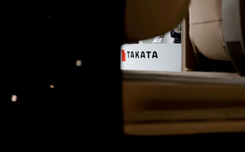 © Reuters. FILE PHOTO: Logo of Takata Corp is seen on its display at a showroom for vehicles in Tokyo