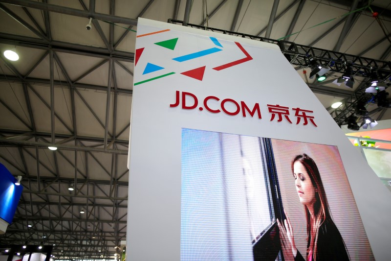 © Reuters. FILE PHOTO: A sign of China's e-commerce company JD.com is seen at CES Asia 2016 in Shanghai