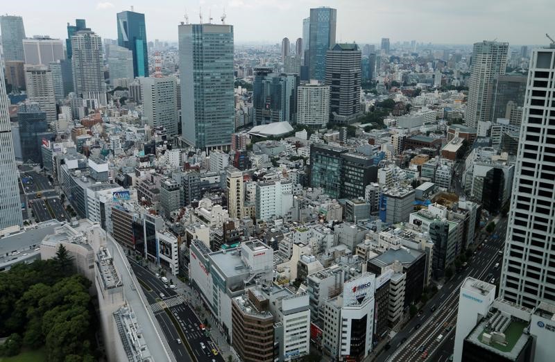 © Reuters. LE GOUVERNEMENT PLUS OPTIMISTE SUR L'ÉCONOMIE JAPONAISE