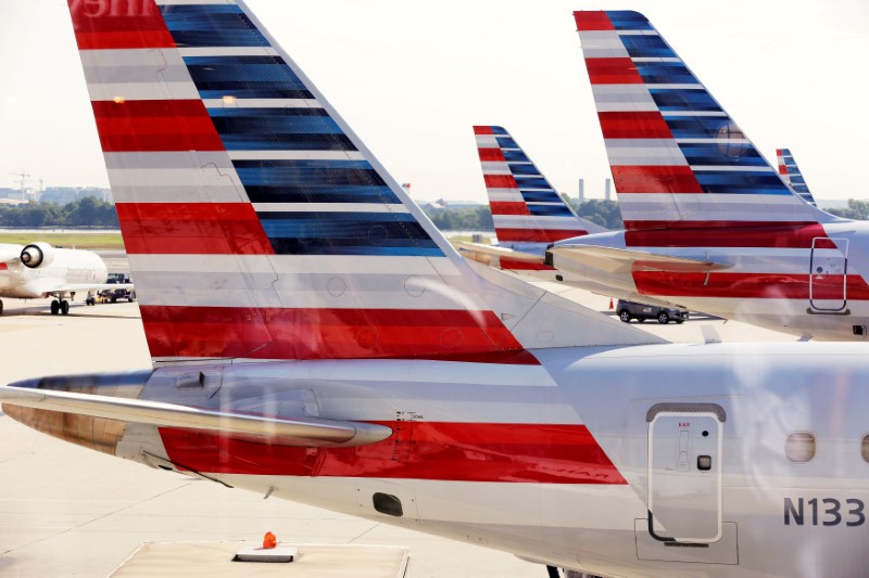 © Reuters. FILE PHOTO - American Airlines aircraft are parked at Ronald Reagan Washington National Airport in Washington.