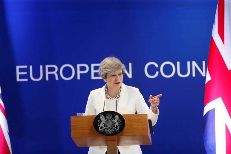 © Reuters. British Prime Minister Theresa May addresses a news conference at the EU summit in Brussels