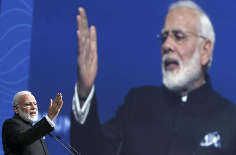 © Reuters. Indian Prime Minister Modi delivers a speech during a session of the St. Petersburg International Economic Forum