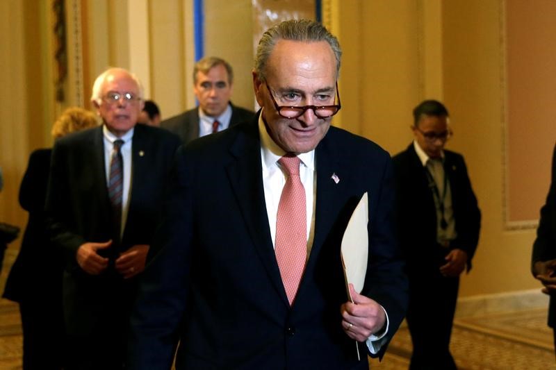 © Reuters. U.S. Senate Minority Leader Chuck Schumer (D-NY) arrives to talk to the media on the president's FY2018 budget proposal on Capitol Hill in Washington