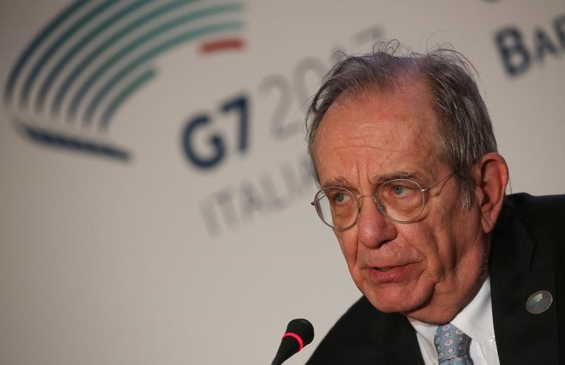 © Reuters. FILE PHOTO: Italy's Finance Minister Pier Carlo Padoan attends a news conference during a G7 for Financial ministers, in the southern Italian city of Bari