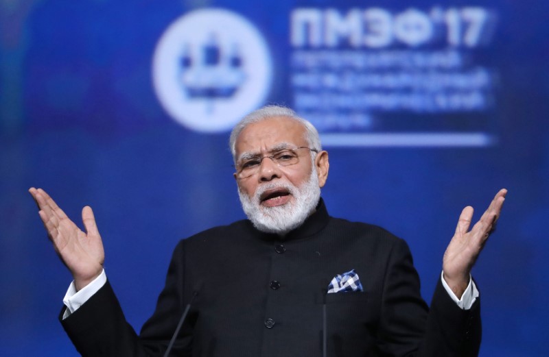 © Reuters. FILE PHOTO: Indian Prime Minister Modi attends a session of the St. Petersburg International Economic Forum