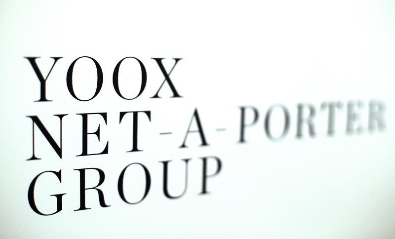 © Reuters. Yoox Net-A-Porter Group placard is seen in Bologna