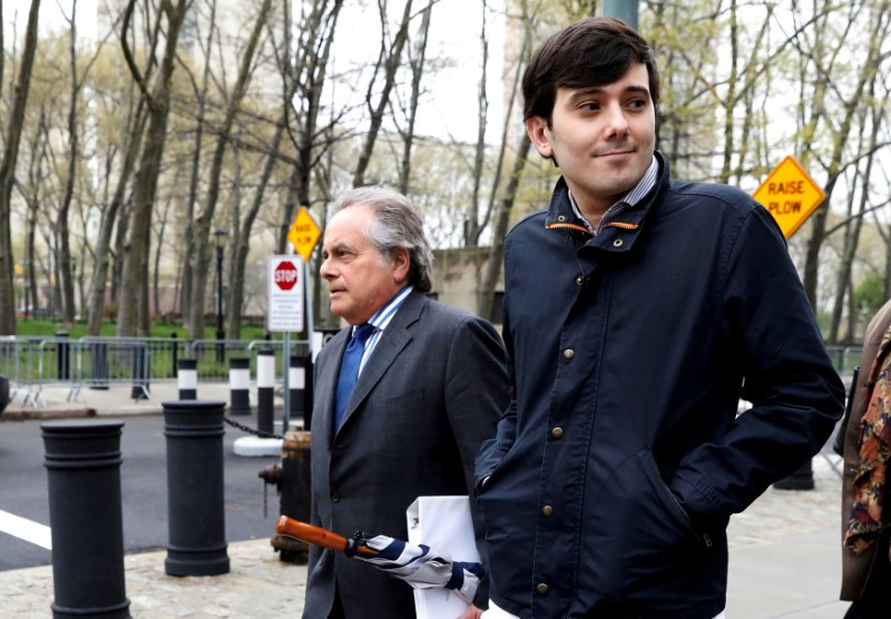 © Reuters. FILE PHOTO - Martin Shkreli departs with his attorney Brafman after a hearing at U.S. Federal Court in Brooklyn New York