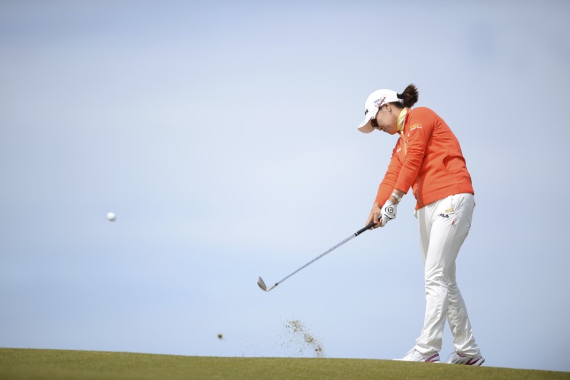 © Reuters. Ryu of South Korea plays her second shot at the 9th hole during the women's British Open golf tournament at the Royal Birkdale Golf Club in Southport