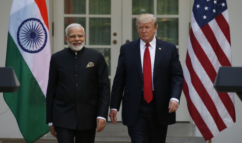 © Reuters. U.S. President Trump and Indian Prime Minister Modi arrive for joint news conference at the White House in Washington