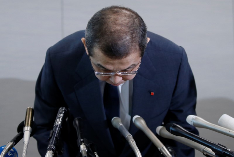 © Reuters. Takata Corp. Chairman and CEO Shigehisa Takada leaves a news conference after its decision to file for bankruptcy protection in Tokyo