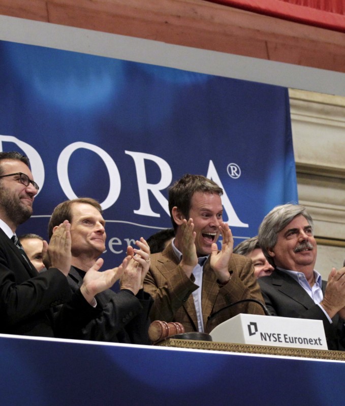 © Reuters. File photo of Joe Kennedy, then president and CEO, and Tim Westergren, co-founder and then chief strategy officer of Pandora internet radio, ringing the opening bell at the New York Stock Exchange