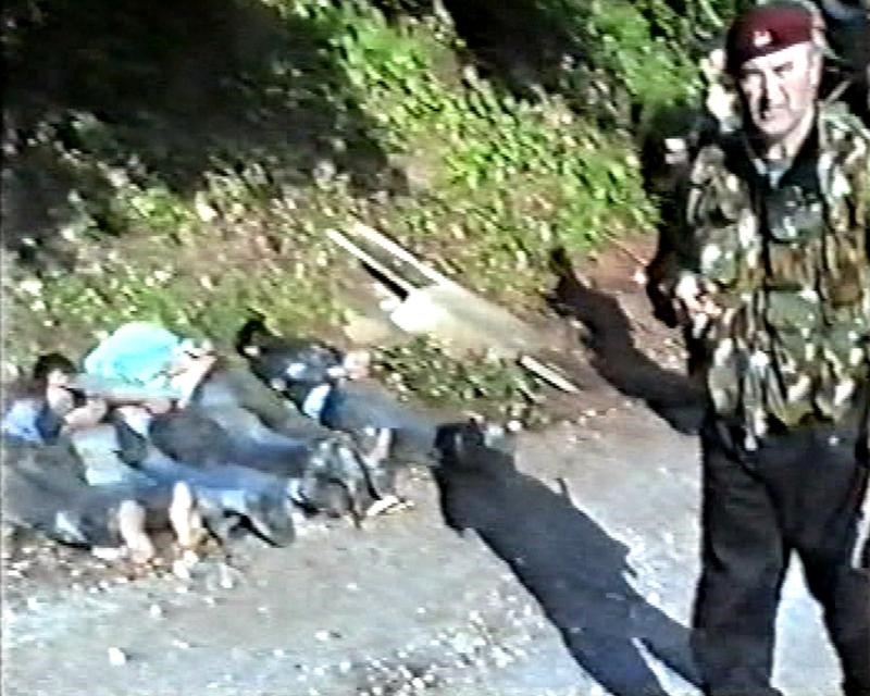 © Reuters. Handout video grab shows murder of Muslims during Bosnian war near Srebrenica.