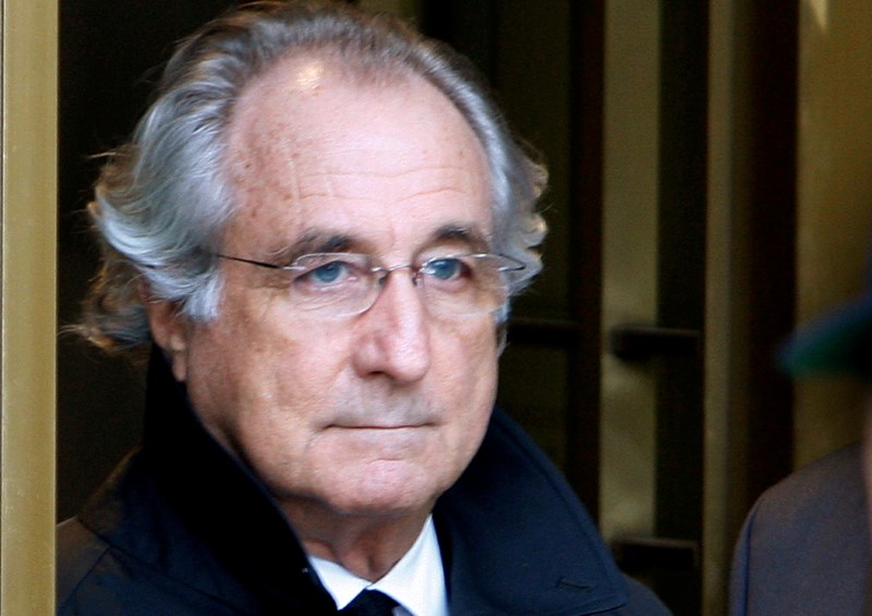 © Reuters. FILE PHOTO: Accused swindler Madoff exits the Manhattan federal court house in New York
