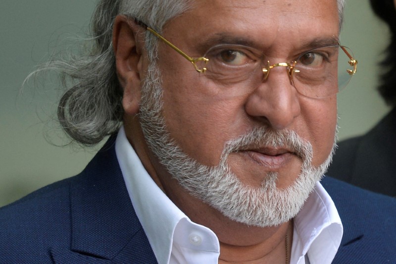 © Reuters. Force India co-owner, Vijay Mallya, leaves after an extradition hearing at Westminster Magistrates Court, in central London