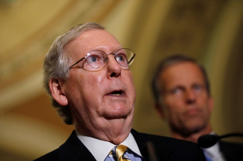 © Reuters. FILE PHOTO: Senate Majority Leader Mitch McConnell speaks to the media about plans to repeal and replace Obamacare on Capitol Hill in Washington