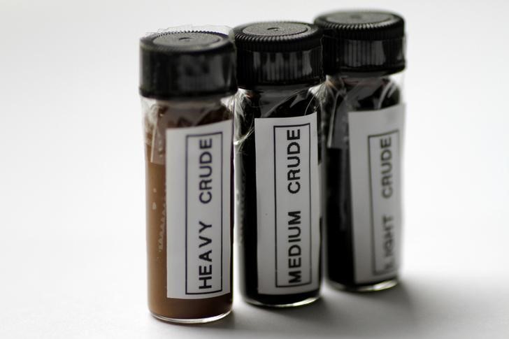 © Reuters. Illustration photo of sample bottles of crude oil