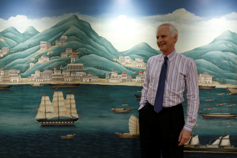 © Reuters. John Slosar, Chairman of Swire Pacific Limited, poses in Hong Kong