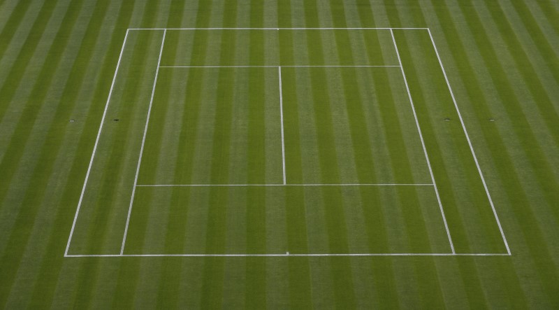 © Reuters. The first of a combination of 12 images shows the grass surface of Centre Court at the All England Lawn Tennis and Croquet Club during the Wimbledon Tennis Championships in London