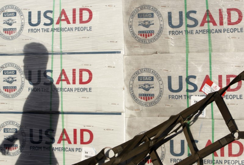 © Reuters. Boxes of relief items from USAID arrive for victims of super typhoon Haiyan, in Manila